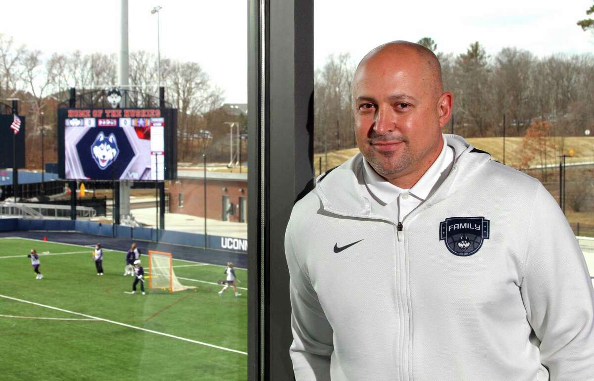 UConn Athletic Director David Benedict, poses at the Joseph J. Morrone Stadium at Rizza Performance Center on the campus in Storrs, Conn., on Thursday Mar. 4, 2021.