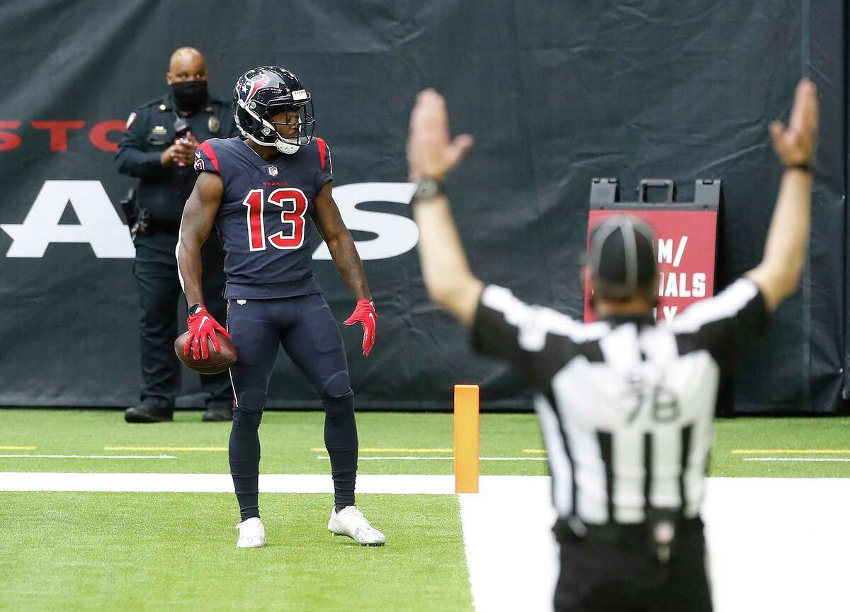Houston Texans wide receiver Brandin Cooks (13) celebrates his touchdown catch during the second quarter of an NFL football game at NGR Stadium, Sunday, December 27, 2020, in Houston.