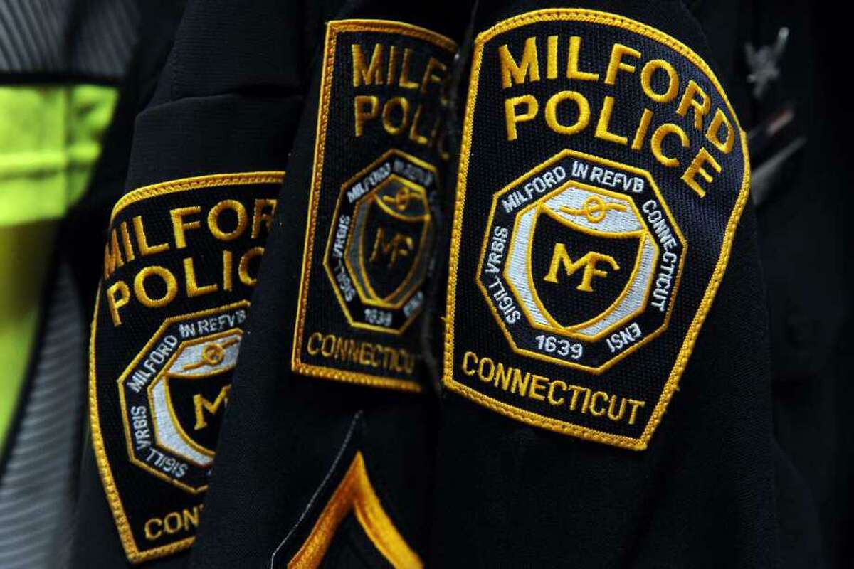 Two Milford residents have been charged in connection with an accidental shooting that seriously wounded a woman last summer.