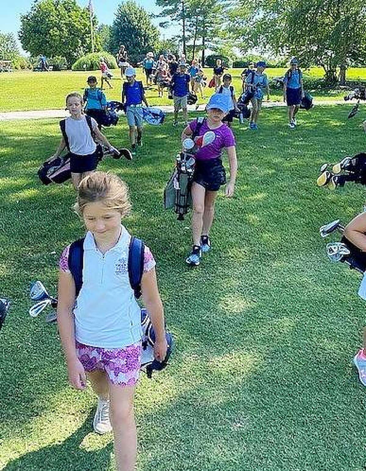 Golfers from the PGA Junior League during a practice session last year at Sunset Hills Country Club.