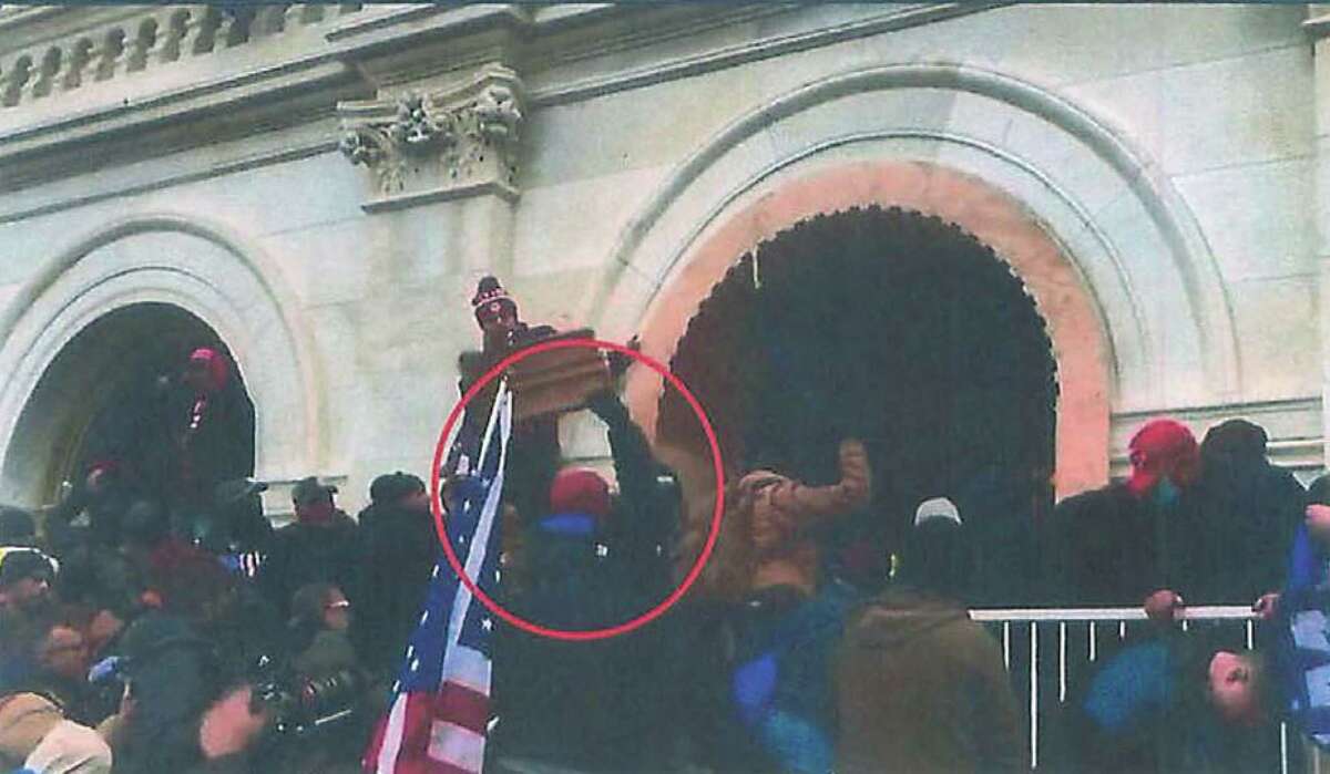 Houston Man Accused Of Smashing Window At Capitol Riot To Remain In Custody