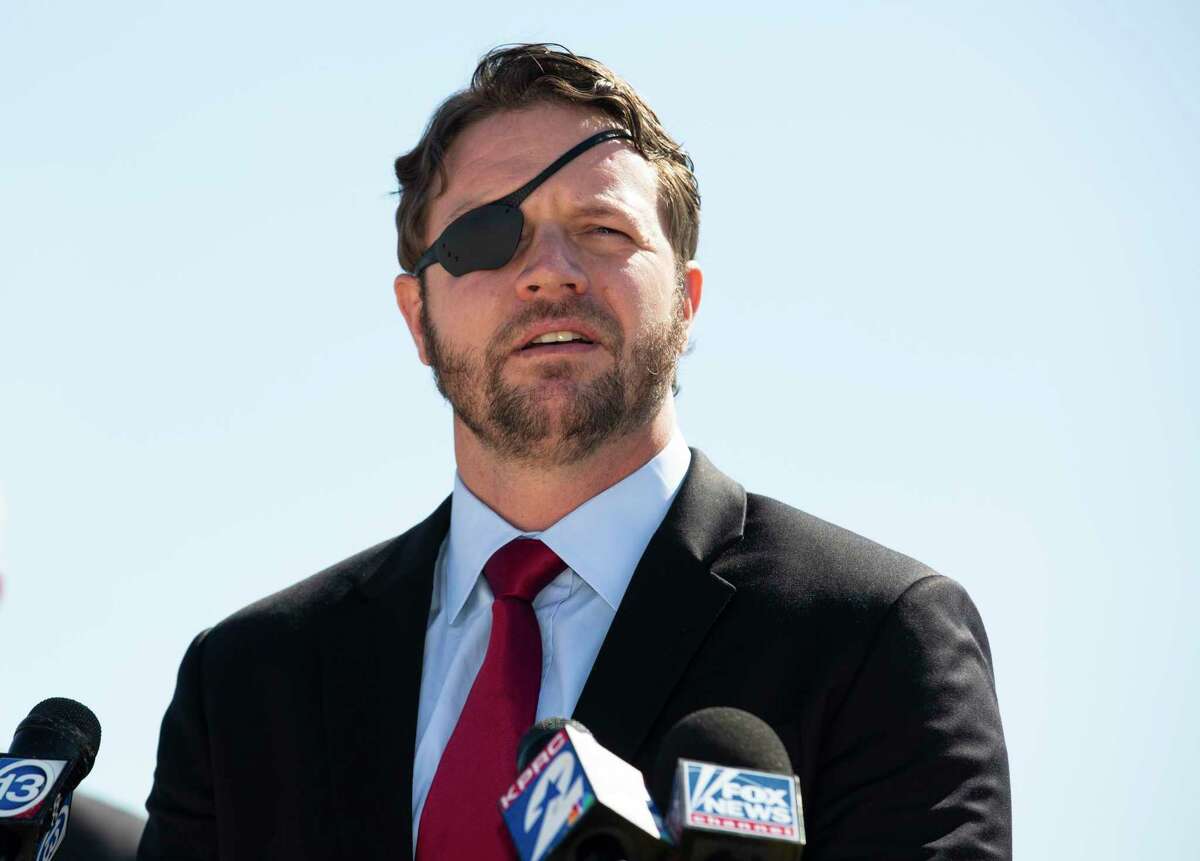 U.S. Representative Dan Crenshaw talks about the negative impact President Joe Biden’s energy policies a during press conferenceTuesday, Feb. 2, 2021, at Houston Ship Channel in Houston. Mmbers of the Republican Houston delegation participated the roundtable with Texas oil and gas workers.