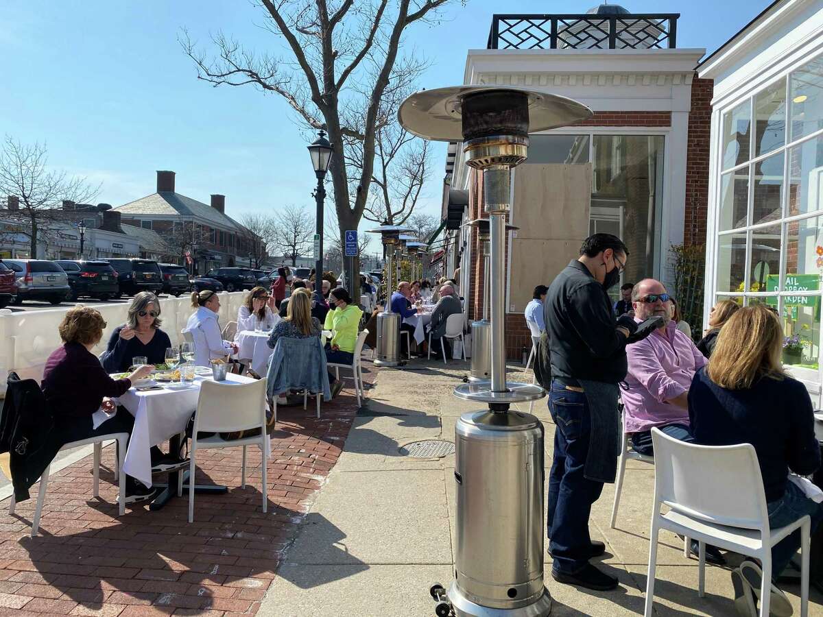 As temperatures flirted with 70s, restaurants courted outside diners
