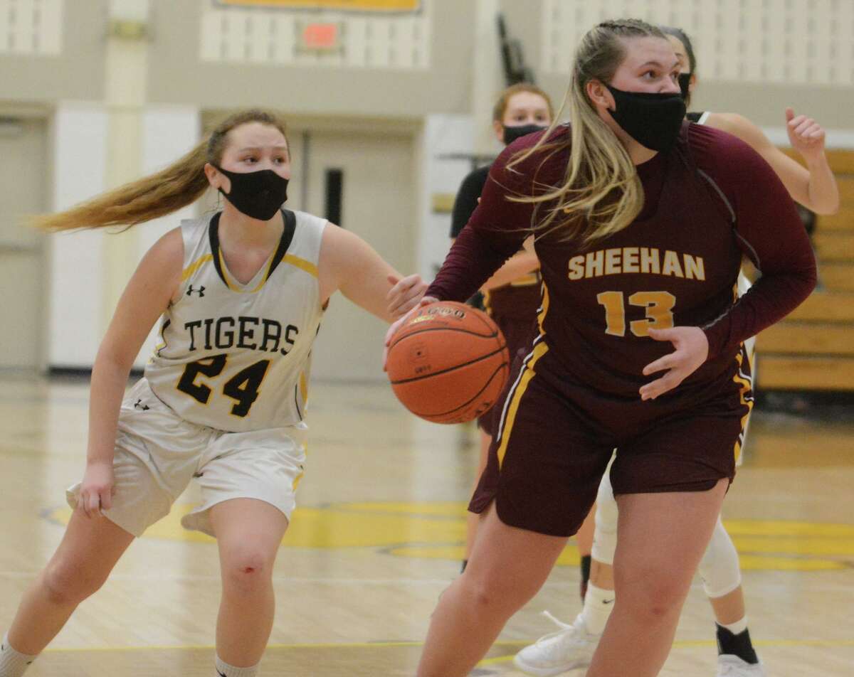 Sheehan’s Caitlyn Hunt (13) handles the ball during a game against Hand earlier this season.