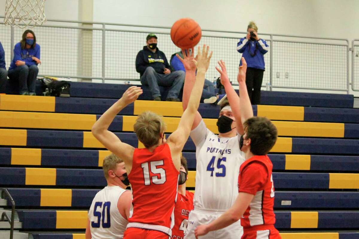 Ben Falk goes up with a contested mid-range jumper. (Robert Myers/News Advocate)
