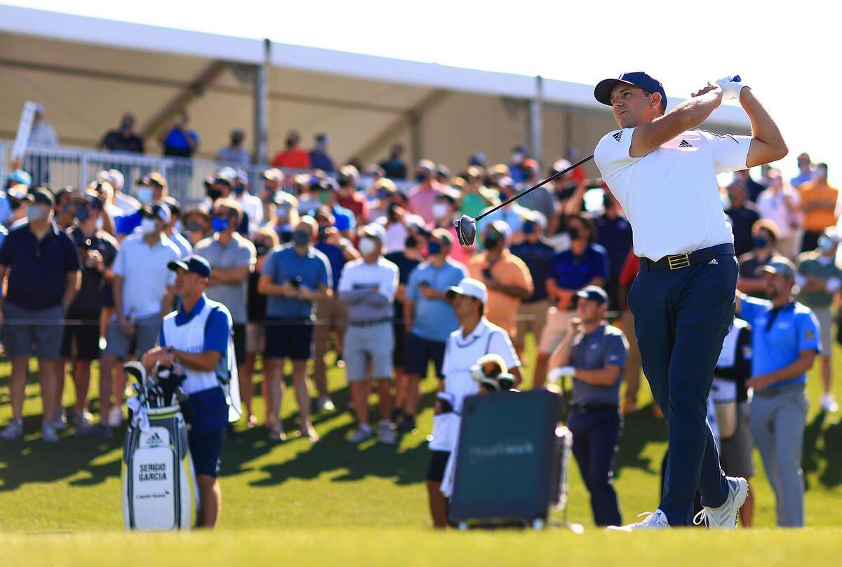 Sergio Garcia plays his shot from the 18th tee in front of fans at The Players Championship in Ponte Vedra Beach, Fla. (Mike Ehrmann/Getty Images/TNS)