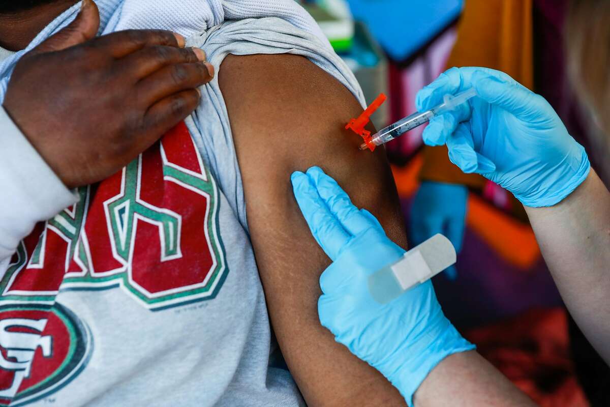 A coronavirus vaccine being administered in Oakland this week during a mass vaccination day for people who are unhoused or at risk of homelessness.