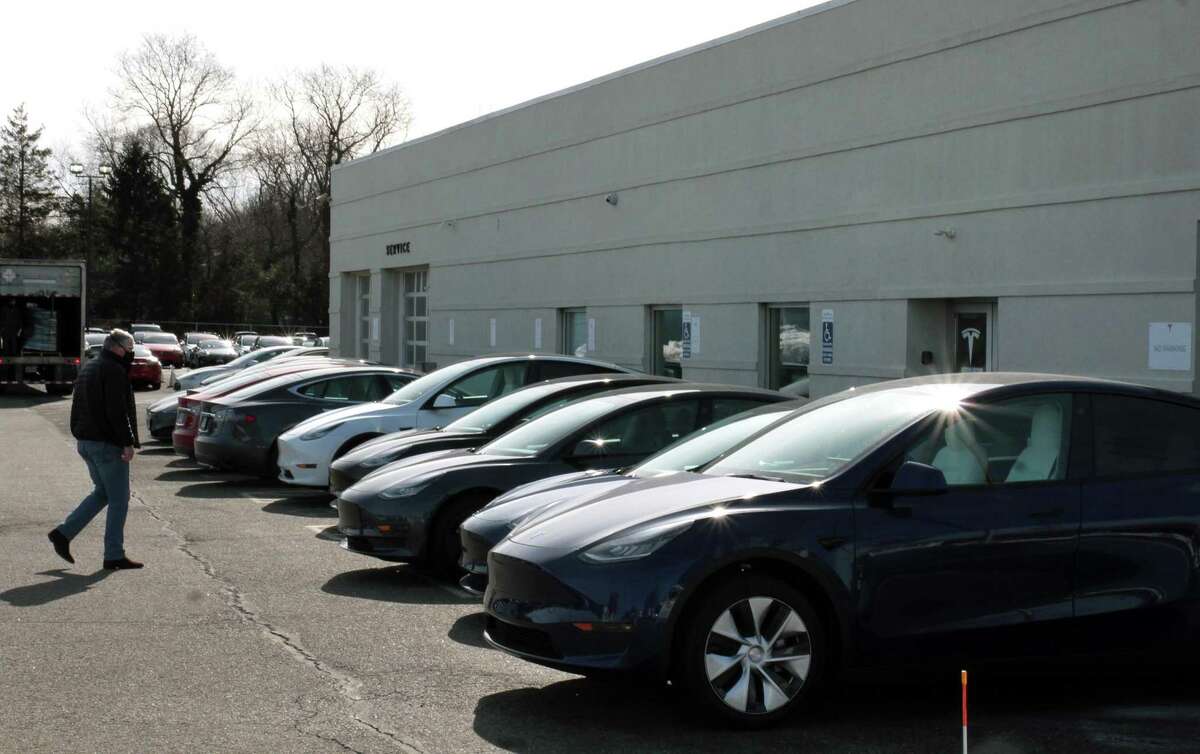 Exterior view of Tesla center along Boston Post Road in Milford, Conn., on Wednesday Feb. 17, 2021.