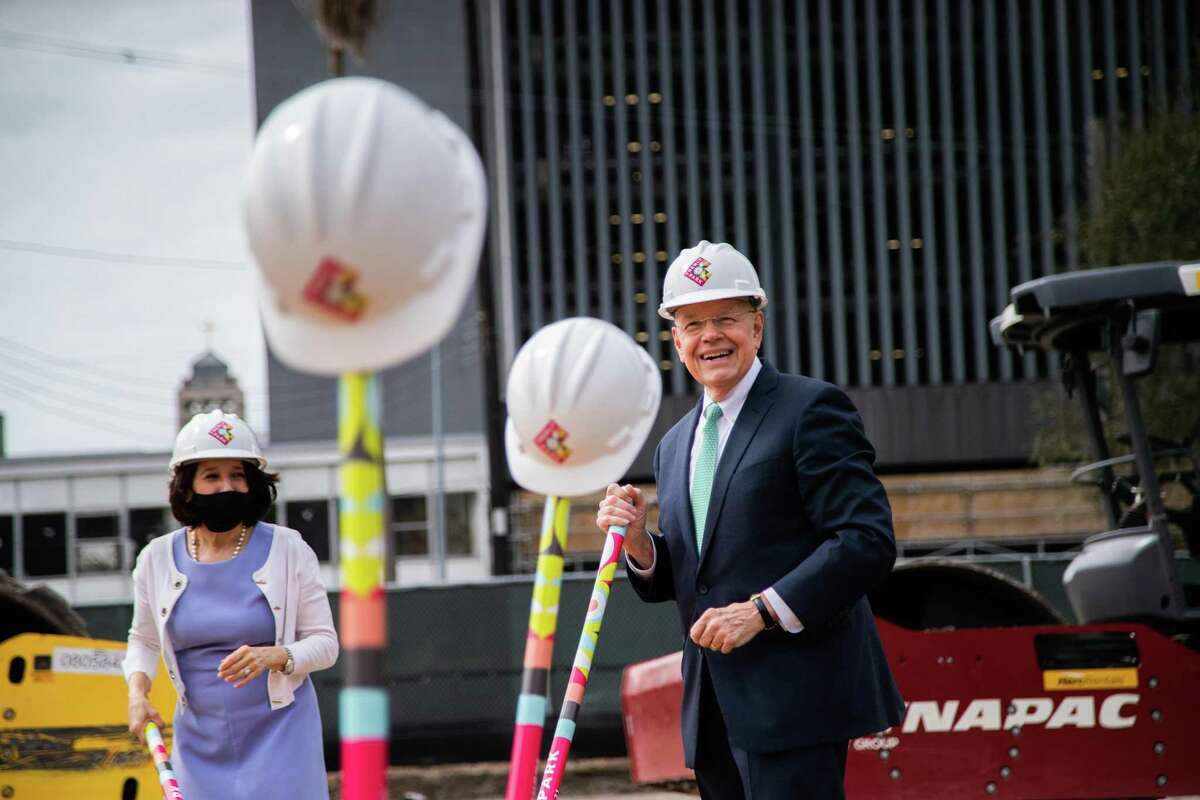 Downtown Redevelopment Authority president Bob Eury, right, grabs a shovel to participate in the groundbreaking and unveiling of name ceremony of the new Houston neighborhood park which will be called Trebly Park. Friday, March 12, 2021, in Houston.