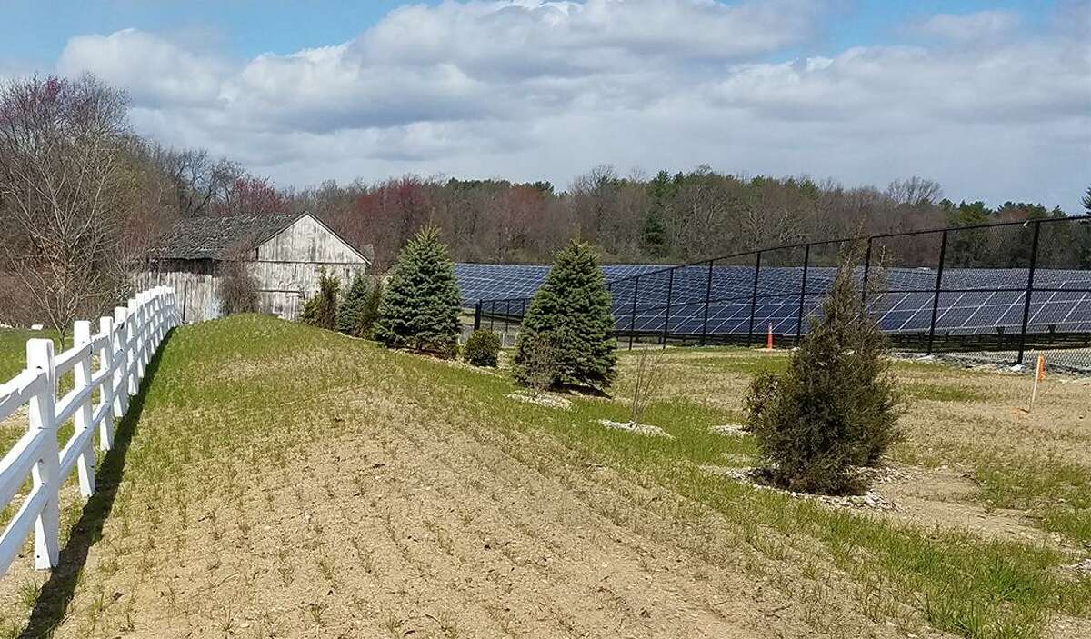 A view of the Tobacco Valley Solar Farm in Simsbury, which went into operation in 2019. The same company that developed this project, D.E. Shaw Renewable Investments, is also behind the Gravel Pit Solar project in East Windsor.