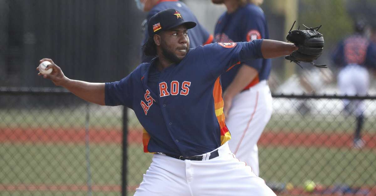 Houston Astros pitcher Pedro Baez throws a bullpen session during the first full squad workouts for the Astros, in West Palm Beach, Florida, Monday, February 22, 2021.