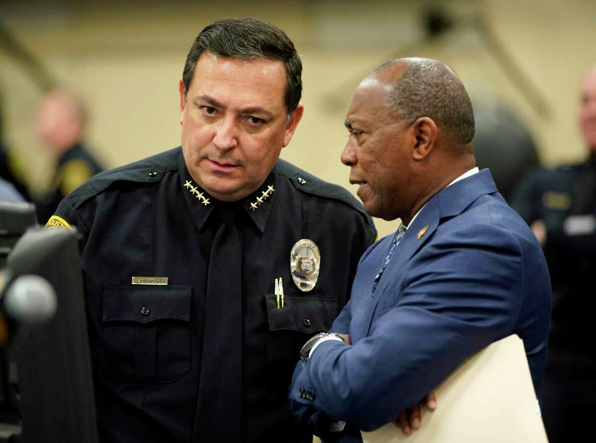 Houston Police Chief Art Acevedo, left, and Houston Mayor Sylvester Turner, right, talk before a press conference held to announce the city’s crime rate for 2018 at the L. D. Morrison, Sr. Memorial Center, 17000 Aldine Westfield, Monday, Jan. 28, 2019, in Houston.