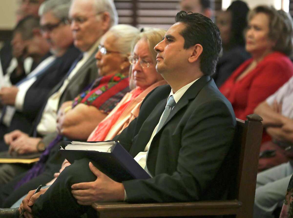 Manuel Medina, former Bexar County Democratic Party chair sits with his supporters, the "Manuelistas" in the Bexar County Courthouse for a civil suit against current Chair Monica Alcantara, on Monday, April 22, 2019.
