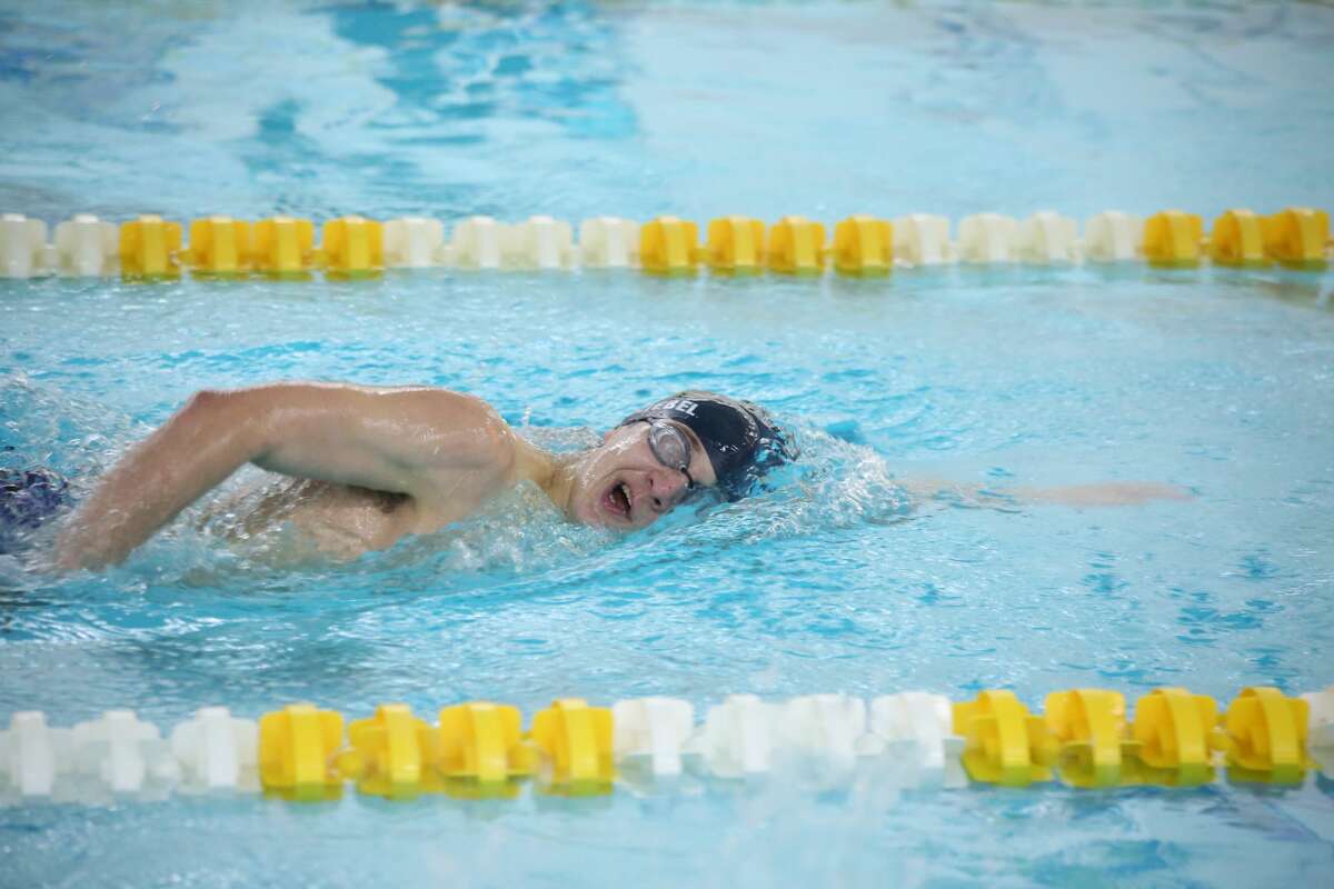 Dow High's Harry Shuster competes in the Boys 100 Yard freestyle during the 2021 Boys SVL Swim Championships March 13, 2021 H. H. Dow High School.