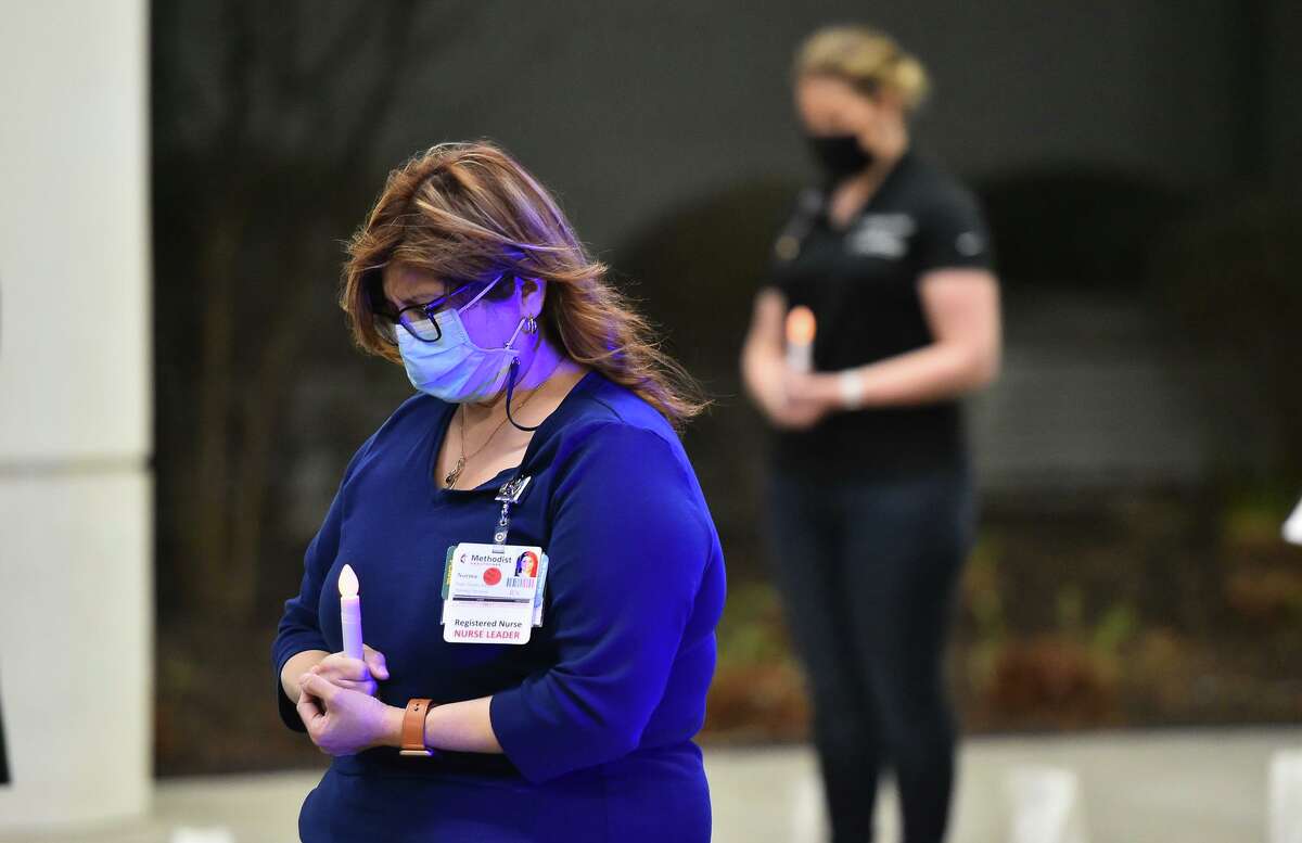 ‘It’s been a long year’ — Coronavirus victims remembered in candlelight vigil at San Antonio