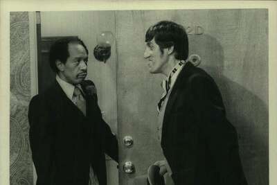 A scene from the 1970s situation-comedy "The Jeffersons," starring Sherman Hemsley, left, as George Jefferson, with co-star Paul Benedict.