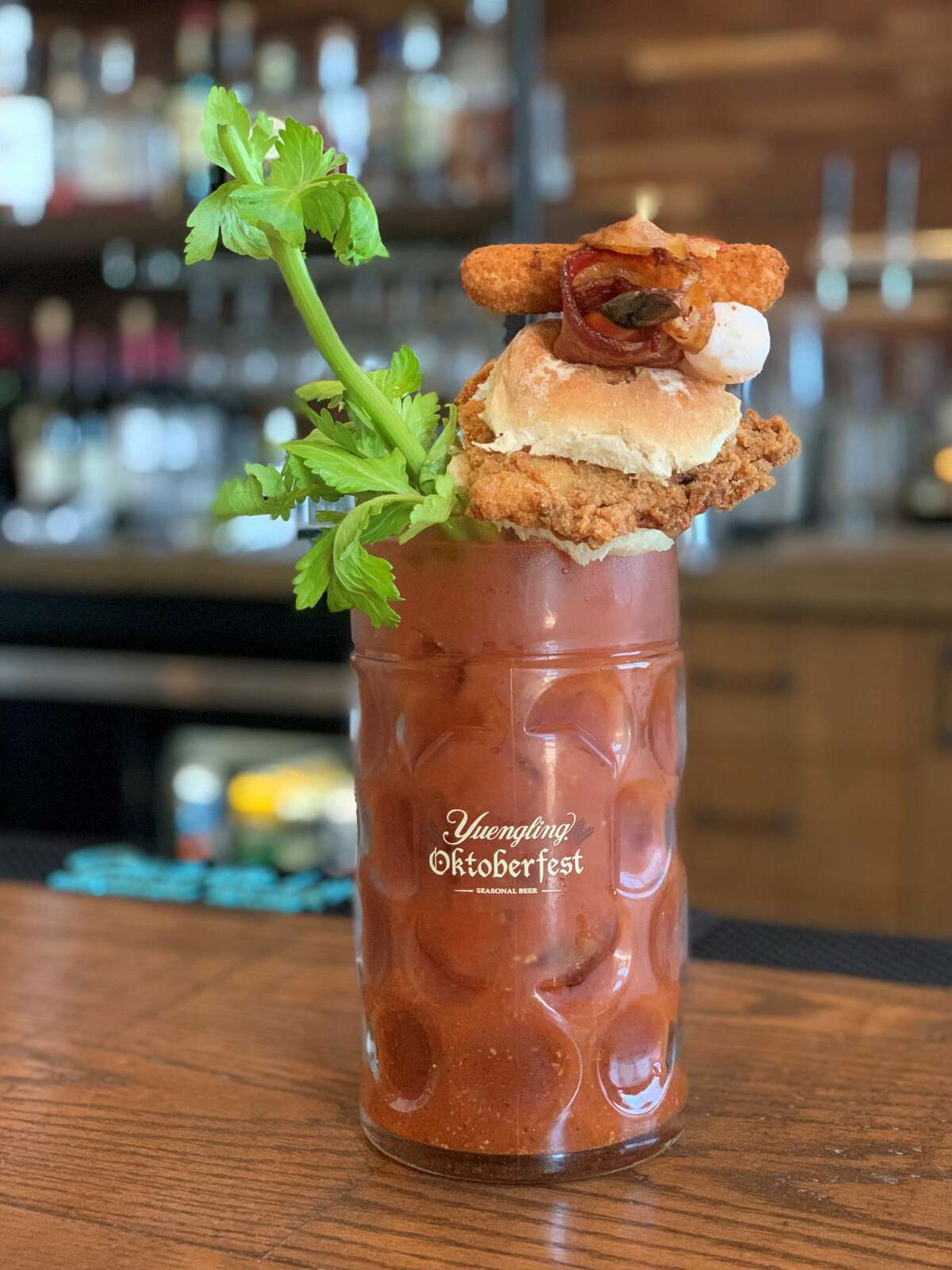 The loaded bloody mary, complete with a small fried chicken sandwich, from The Hideaway in Saratoga Springs.
