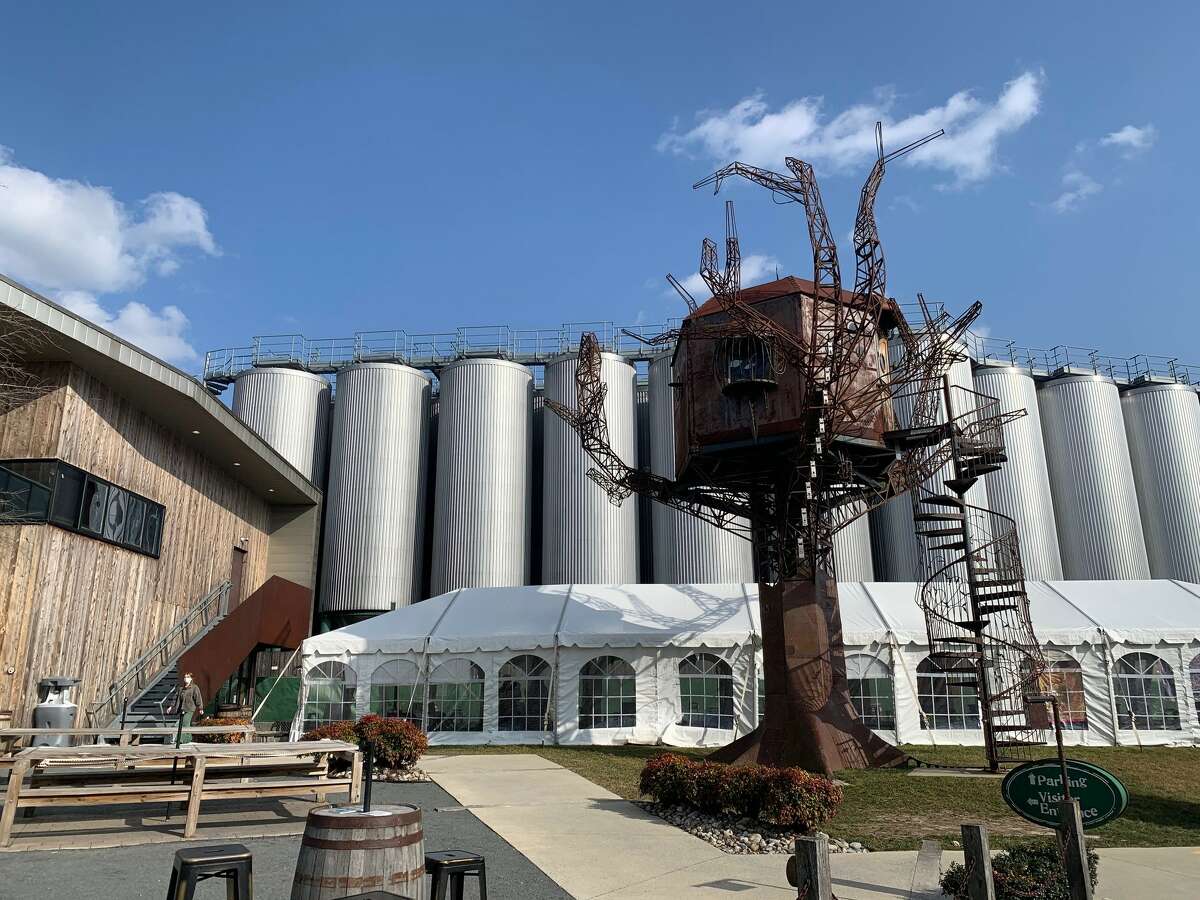The Milton location of the DogFish Head Brewery. The steampunk tree sculpture was once at a Burning Man festival.