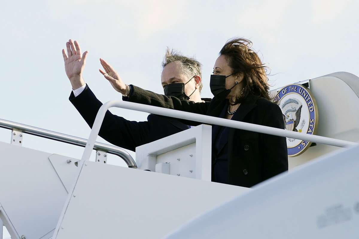 Vice President Kamala Harris and her husband, Doug Emhoff, board Air Force Two at Andrews Air Force Base in Maryland on March 15, 2021.