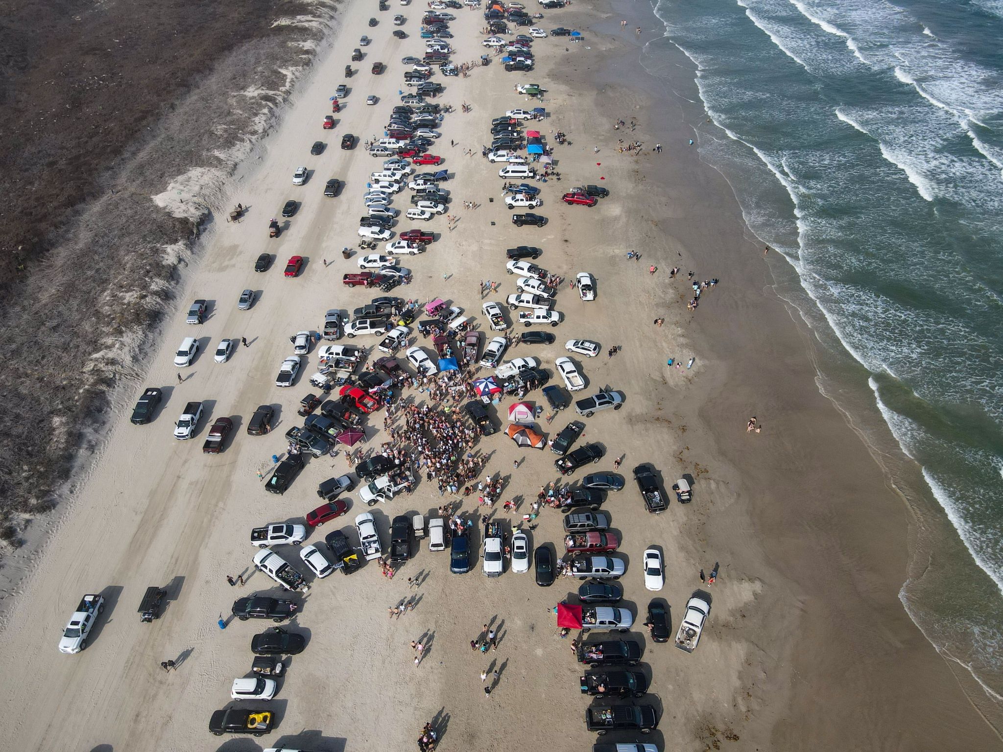 Photos show Spring Breakers are showing up at South Texas beaches