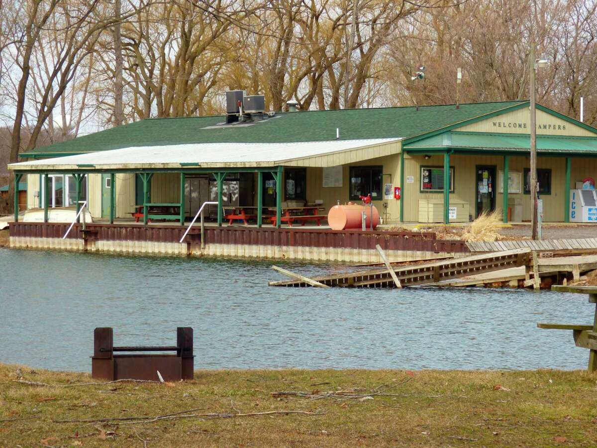 Water levels on the Great Lakes and connected bodies of water have dipped below recent highs, but remain significantly higher than their long-term averages. Pictured is Insta Launch Campground, Cabins and Marina on the shore of the Manistee River. (Scott Fraley/News Advocate)