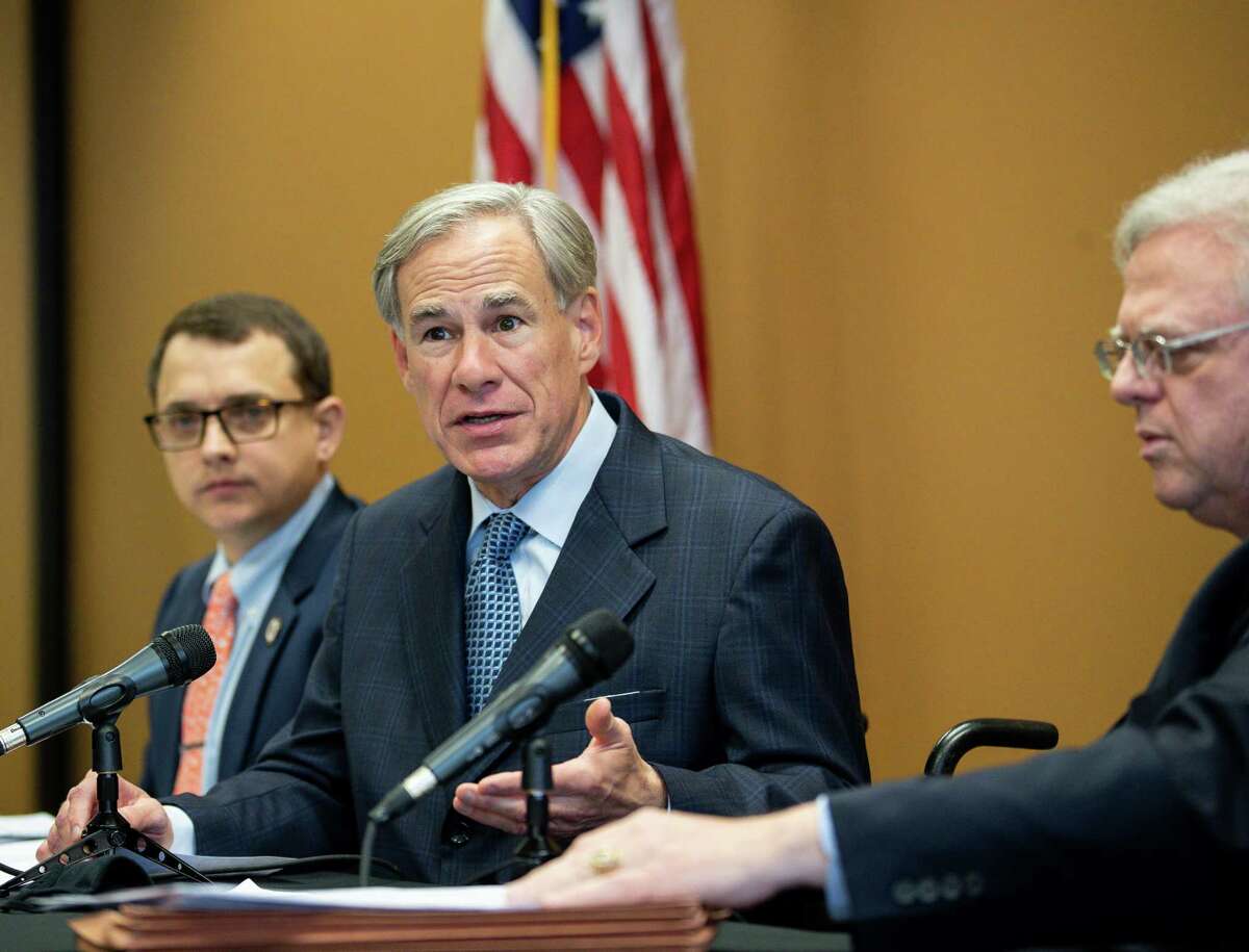 Gov. Greg Abbott talks to reporters during a press conference about a package of election reforms, at Senator Paul Bettencourt's District Office on Monday, March 15, 2021, in Houston.