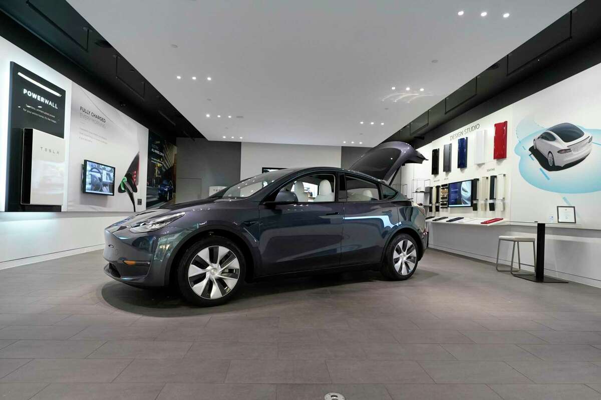 A Tesla Model Y Long Range is displayed on Feb. 24, 2021, at the Tesla Gallery in Troy, Mich.