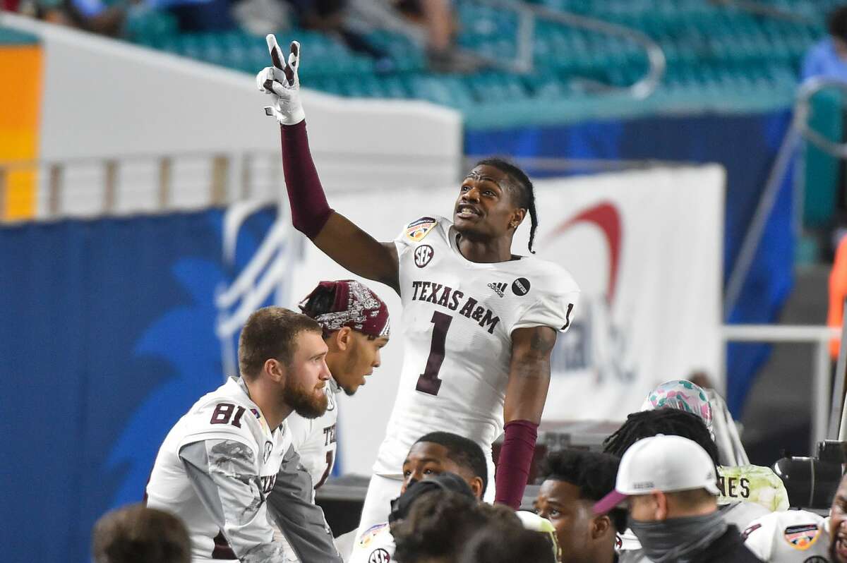 Demond Demas #1 of the Texas A&M Aggies waves to the fans after his team scored a touchdown during the fourth quarter of the Capital One Orange Bowl against the North Carolina Tar Heels at Hard Rock Stadium on Jan. 2, 2021 in Miami Gardens, Fla.