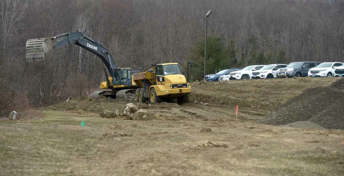 Construction started on the new school being built on the Huckleberry Hill campus. The school will serve pre-kindergarten through fifth grade. Tuesday March 16, 2021, in Brookfield, Conn. A new driveway/access road is being constructed.