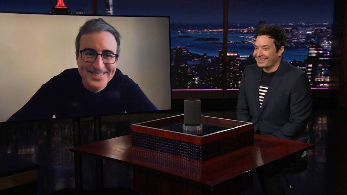 Comedian John Oliver and host Jimmy Fallon play "Hey Robot" on March 15, 2021.