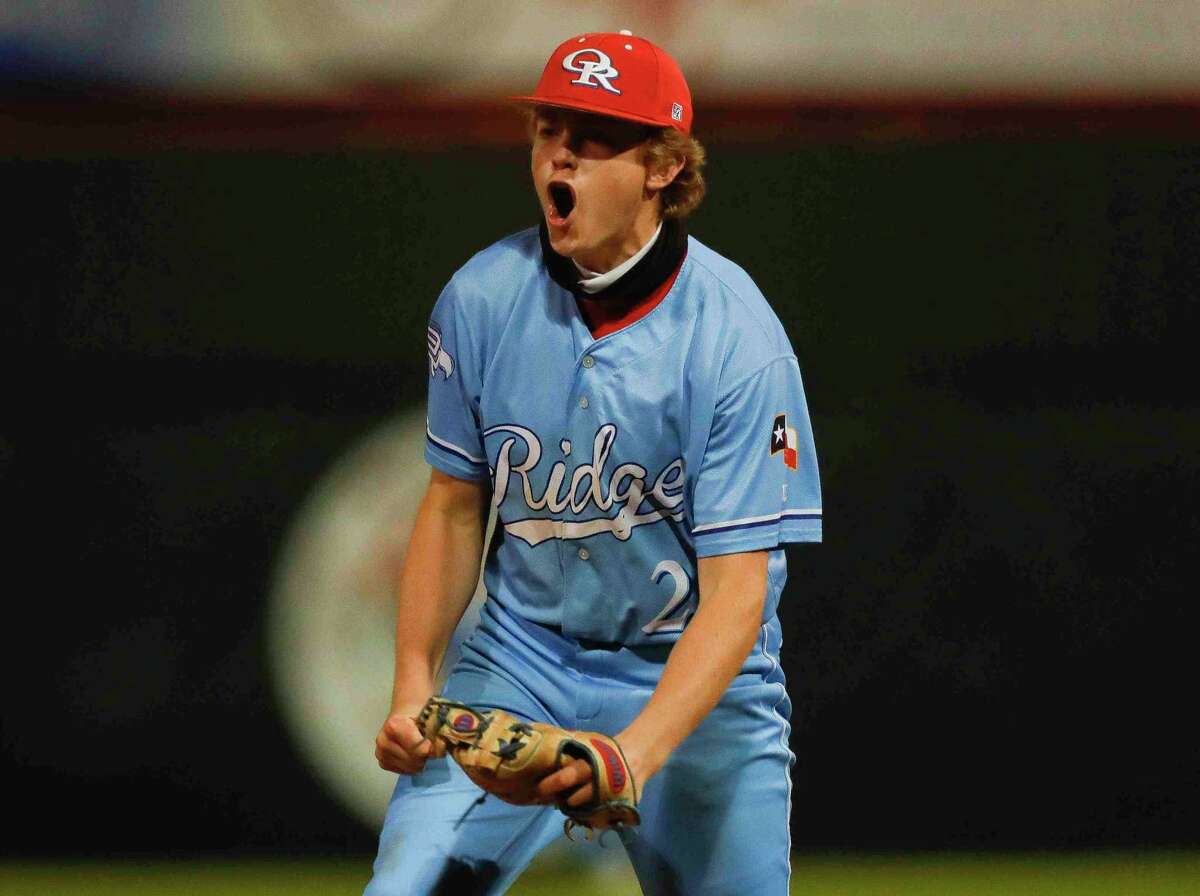 Oak Ridge relief pitcher Aiden Lucas (2) reacts after striking out Conner Doucet #23 of The Woodlands to seal the War Eagles’ 6-5 win over the Highlanders in the seventh inning of a District 13-6A high school baseball game, Wednesday, March 17, 2021, in The Woodlands.