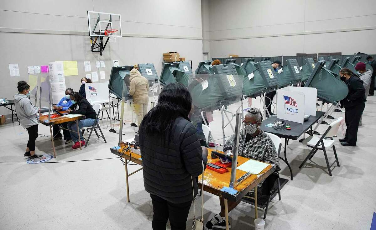 Voters cast their ballots at Victory Houston polling station in Houston on Friday, Oct. 30, 2020. The location was one of the Harris County's 24-hour locations.