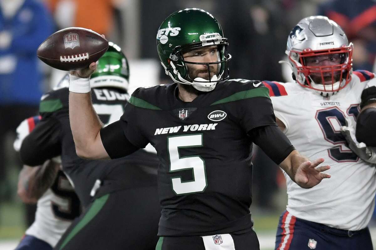 FILE - In this Monday, Nov. 9, 2020, file photo, New York Jets quarterback Joe Flacco throws during the first half of an NFL football game against the New England Patriots in East Rutherford, N.J. The Los Angeles Chargers host the winless Jets on Sunday, in a midseason matchup of struggling teams. (AP Photo/Bill Kostroun, File)