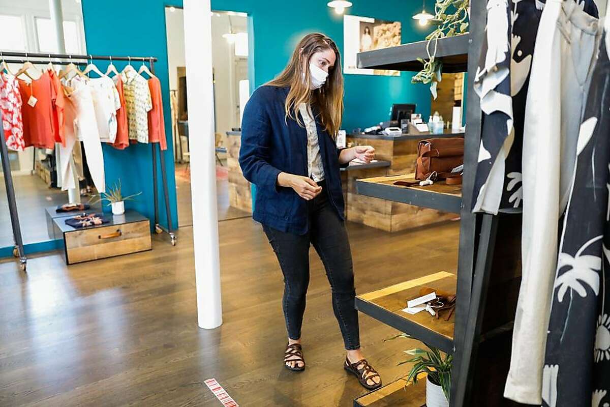 Store manager Kathryn Sandretto works at Acote boutique on Hayes Street in Hayes Valley on Wednesday, June 17, 2020 in San Francisco.