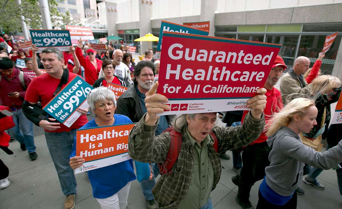 Supporters of single-payer health care march to the Capitol, Wednesday, April 26, 2017, in Sacramento, Calif. A bill, SB562, by Democratic State Senators Ricardo Lara and Toni Atkins, would substantially remake the health care system of the nation's most populous state by eliminating insurance companies and guaranteeing coverage for everyone. (AP Photo/Rich Pedroncelli)