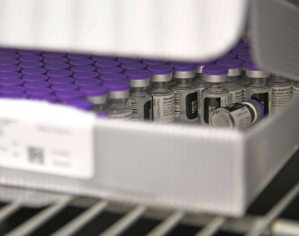 The Pfizer COVID-19 vaccine is kept refrigerated until it is needed and then diluted for injection.