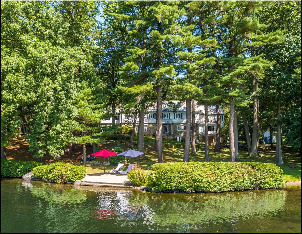 On the market Waterfront Stratford house in private lake community