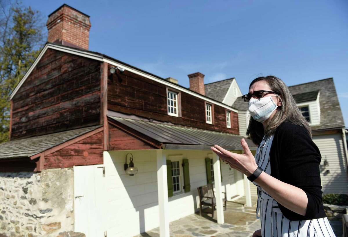 Greenwich Historical Society Director of Education Anna Greco shows the upstairs slave quarters at the Bush-Holley House in the Cos Cob section of Greenwich, Conn. Thursday, March 11, 2021.