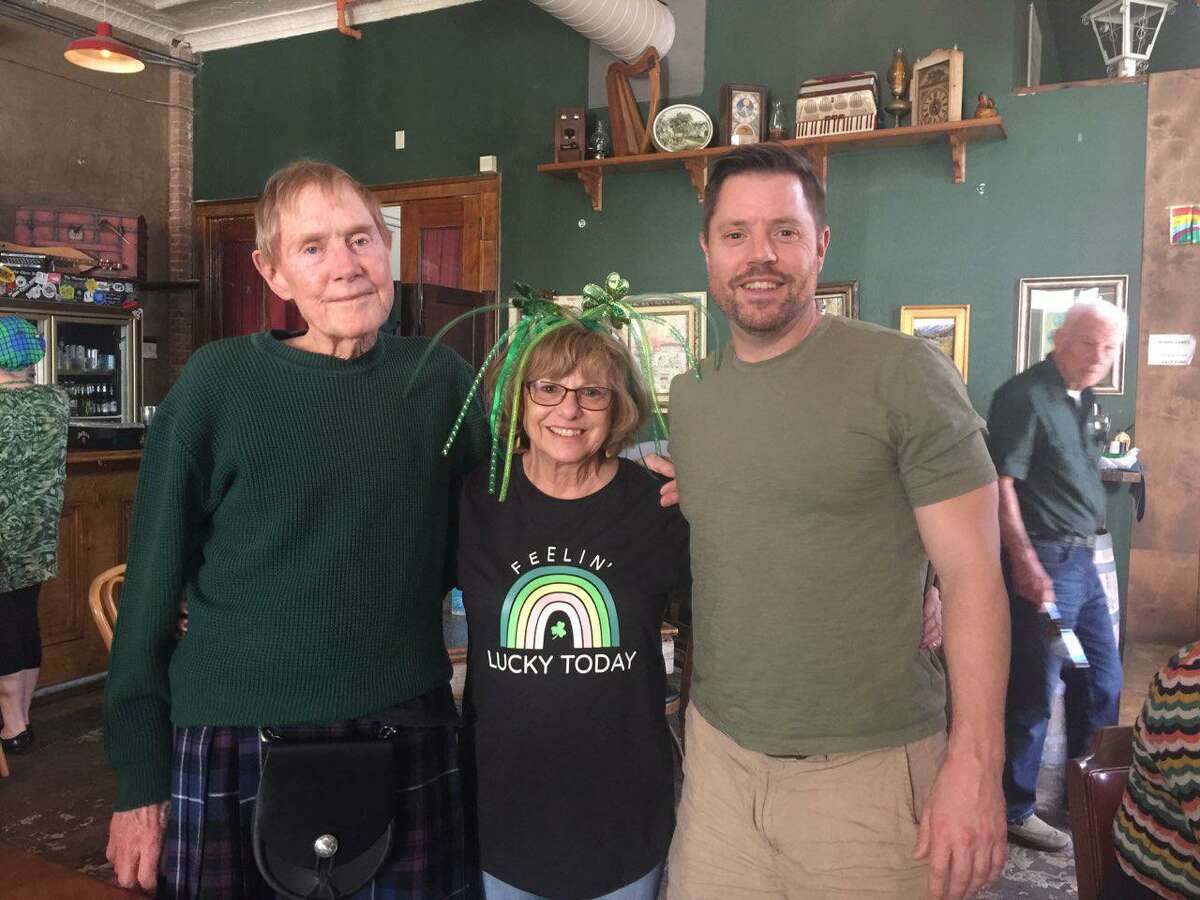 From left Mike, Frances and Ryan McDougal at a previous Conroe's St. Patrick's Day Walking Parade at The Corner Pub. McDougal was a founder of the parade along with the late Pat Green and the late David Anderson.