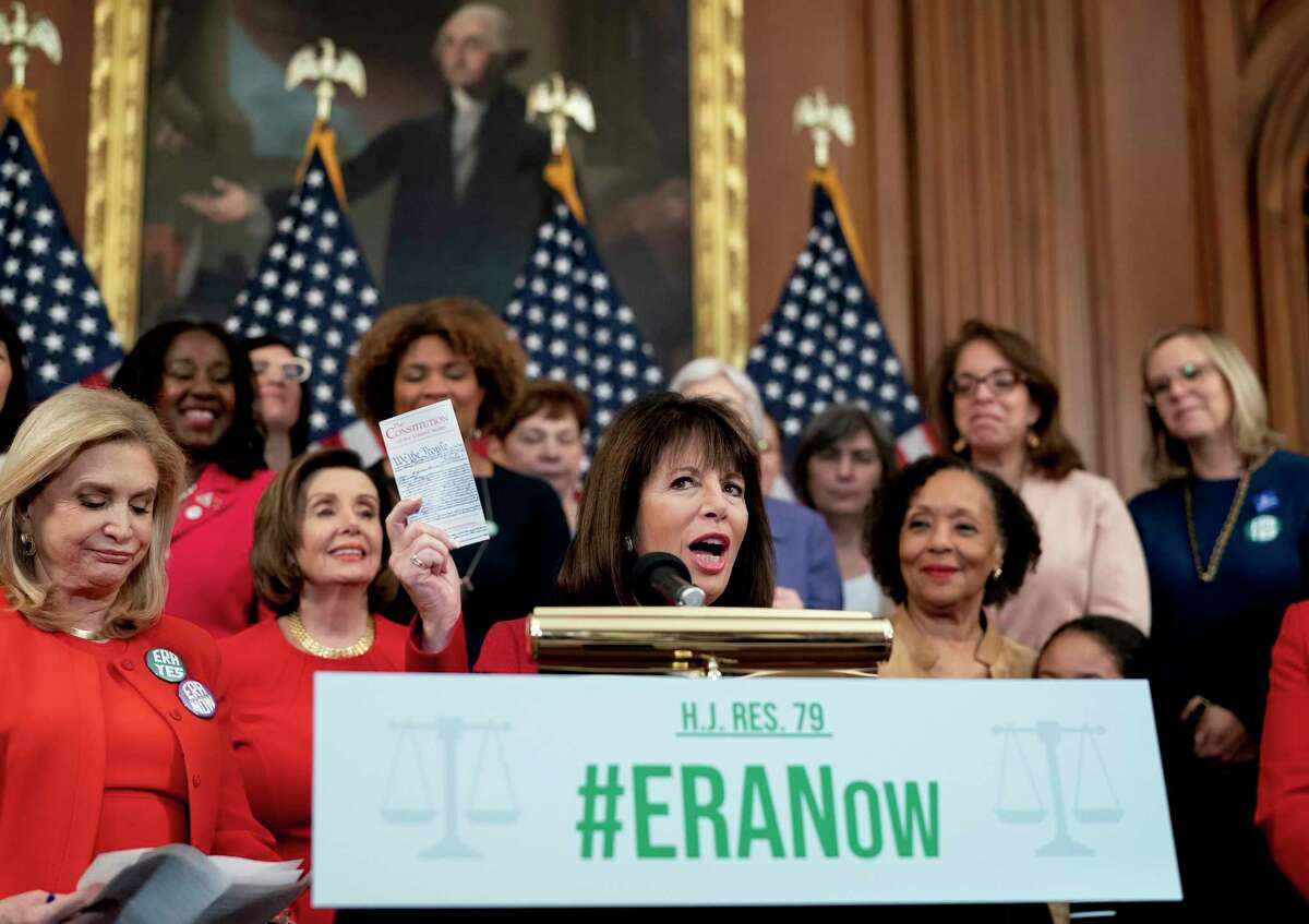 In this February 2020 photo, California Rep. Jackie Speier, with other congressional Democrats including House Speaker Nancy Pelosi, speaks in favor of removing the deadline for ratification of the Equal Rights Amendment