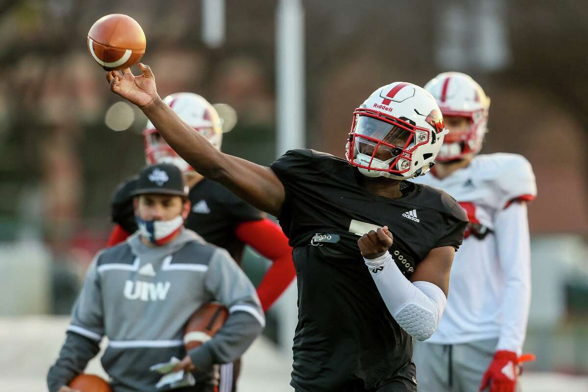 UIW quarterback Cameron Ward throws a pass during a morning practice at Gayle and Tom Benson Stadium on Tuesday, Feb. 23, 2021. UIW plays its first game of the spring Southland Conference season Saturday at McNeese State.