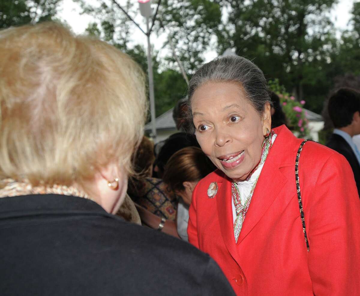 YWCA of Greenwich Spirit Award winner, Nancy Brown, right, during the ceremony at the Greenwich home of Brian and Giovanna Miller, Conyers Farm, Greenwich, Conn., Tuesday night, Sept. 16, 2014. Brown of Greenwich, was one of 10 outstanding women volunteers honored by the YWCA for their community service.