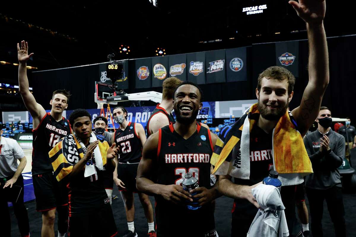 Hartford players wave to fans in attendance following their first-round loss to Baylor in the NCAA Tournament on March 19 in in Indianapolis. It was the first time the Hawks advanced to the Division I NCAA Tournament in school history.