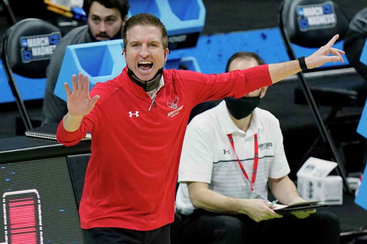 Hartford head coach John Gallagher yells to his players during the first half against Baylor in the first round of the NCAA Tournament at Lucas Oil Stadium in Indianapolis on March 19.