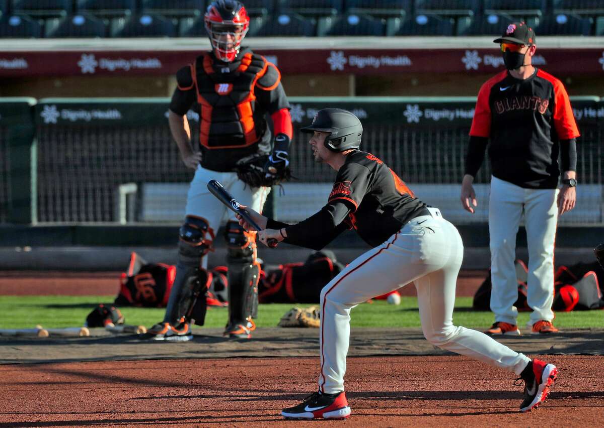 Aaron Sanchez (48) practices bunting as the San Francisco Giants worked out at Scottsdale Stadium in Scottsdale, Ariz., on Tuesday, March 2, 2021.