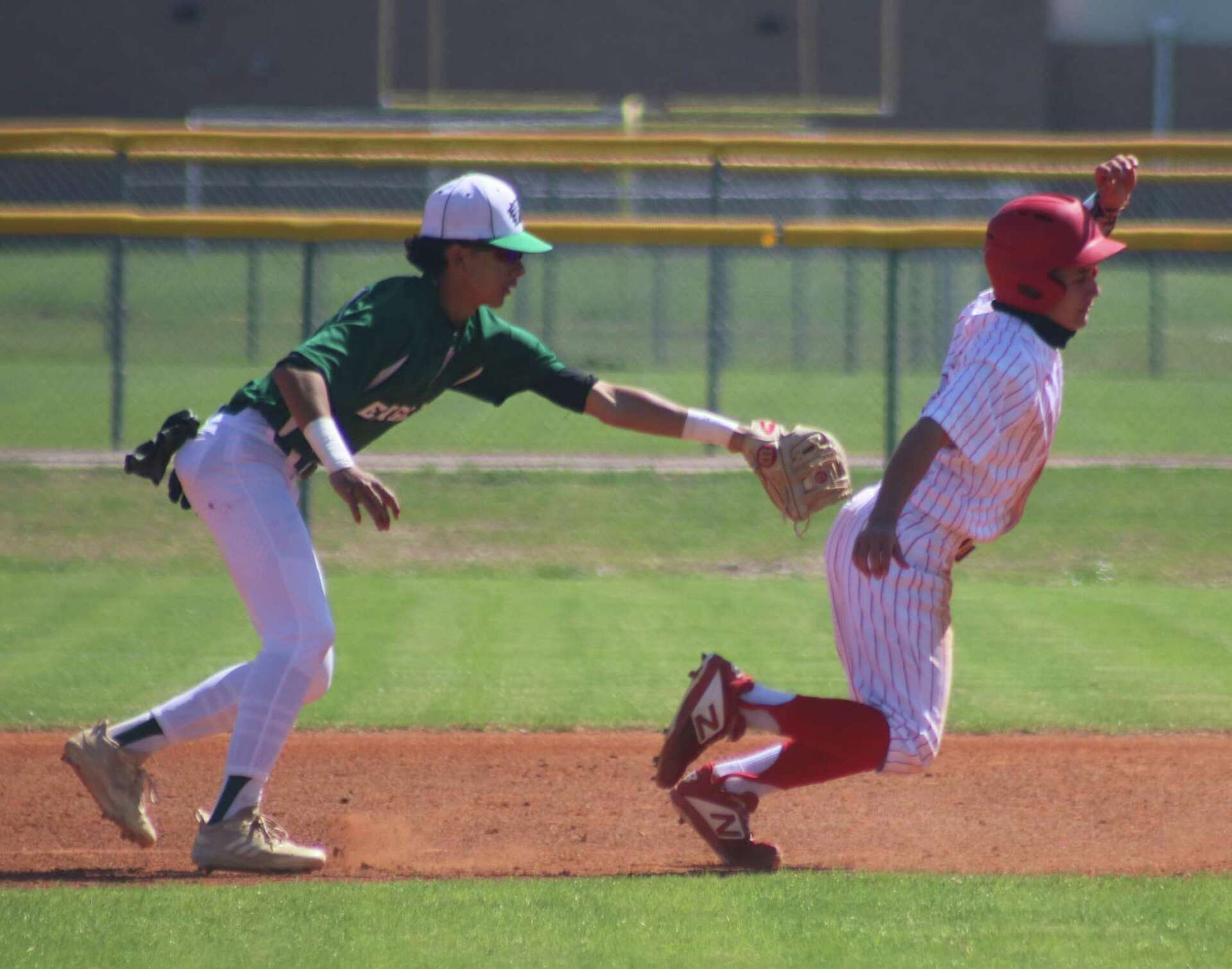 Deer, Trojans end spring break with district victories