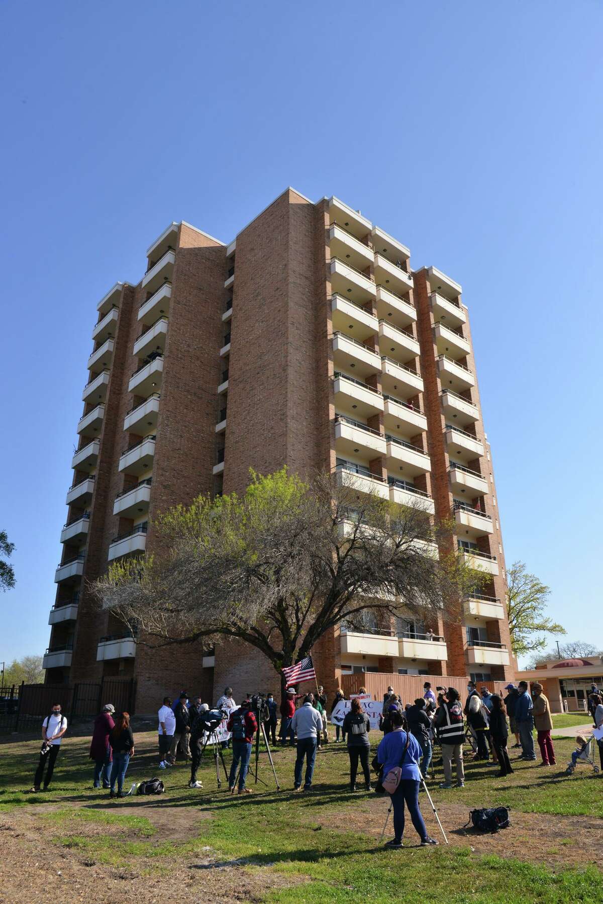 People gathered Saturday outside the Fair Avenue Apartments, a housing complex for elders run by the San Antonio Housing Authority. The people are members of various community groups protesting housing authority and city officials for what they say is a continuing lack of accountability for the inaction and lack of preparation for the recent winter storm at housing authority properties.