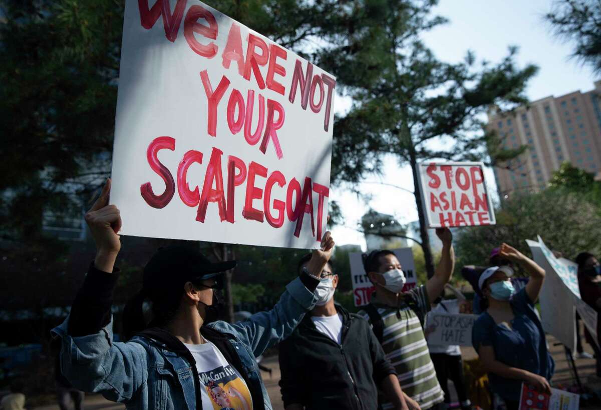 Photos Stop Asian Hate Vigil Rally Held At Discovery Green