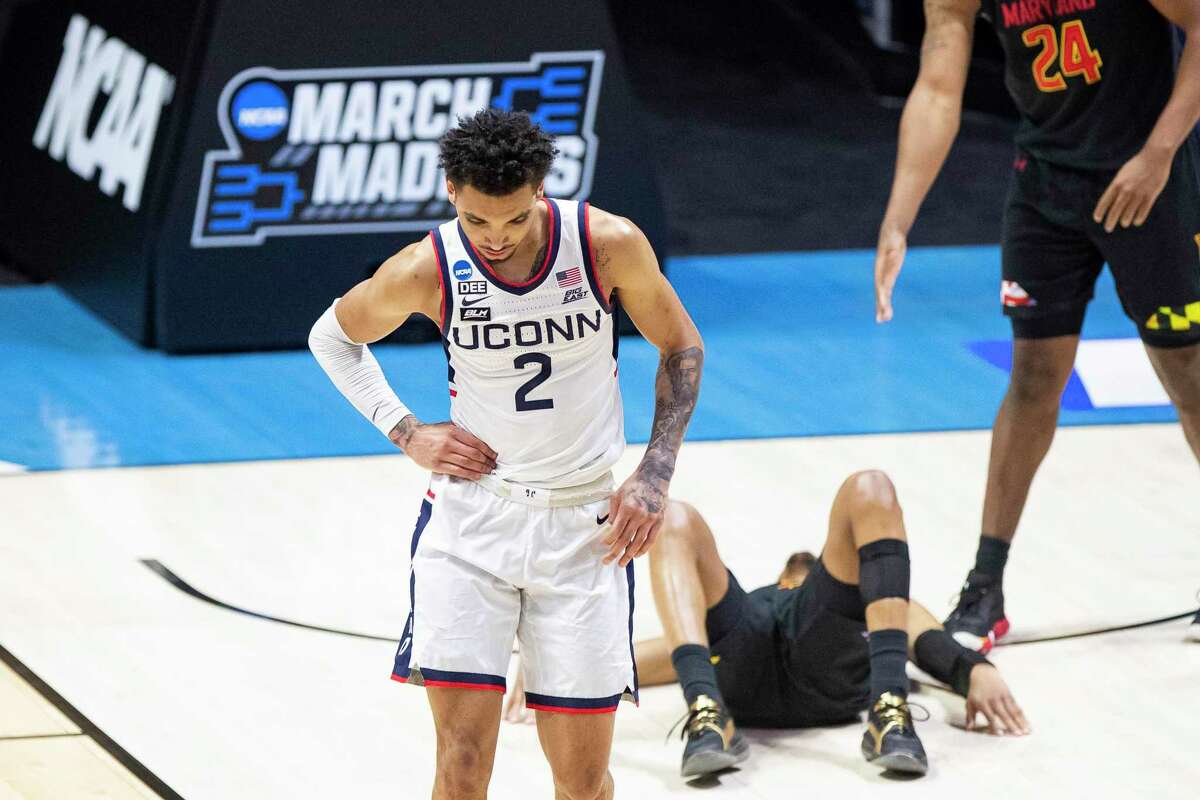 Connecticut's James Bouknight (2) reacts late in the second half of their 63-54 loss to Maryland in a first-round game in the NCAA men's college basketball tournament, Saturday, March 20, 2021, at Mackey Arena in West Lafayette, Ind. (AP Photo/Robert Franklin)