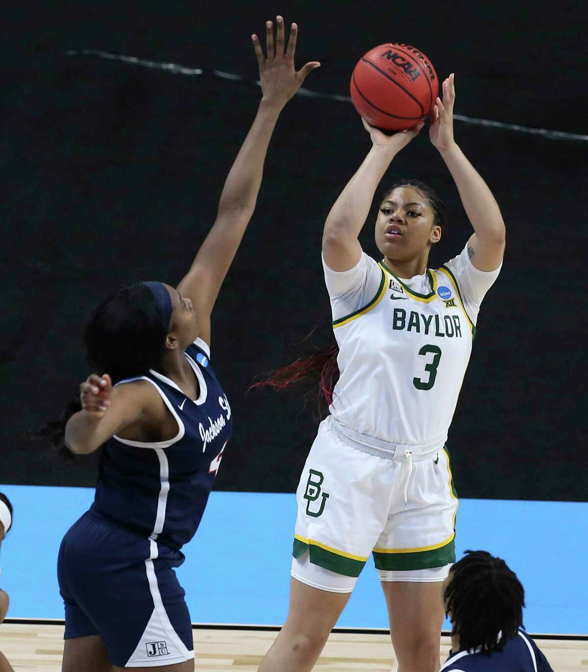 Baylor's Trinity Oliver (03) shoots over Jackson State's Ameshya Williams (04) in the first round of the 2021 NCAA Div. I Women's Basketball Championship at the Alamodome on Sunday, Mar. 21, 2021. Baylor defeated Jackson State, 101-52 to move onto the second round.